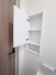 主寝室近くのトイレの壁面収納